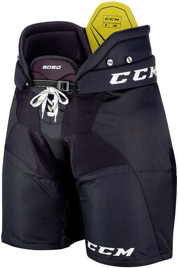 Červené hokejové kalhoty - junior CCM - velikost XL